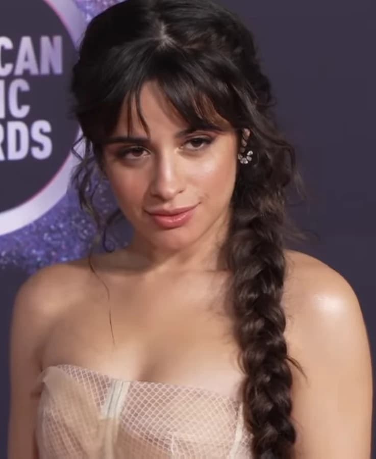 Camila Cabello wearing sunshine pastel outfits with fluid fabric and glow, showcasing sherbet peach, sea glass, buttermilk, mint foam, and rose coral from the Light Spring palette.