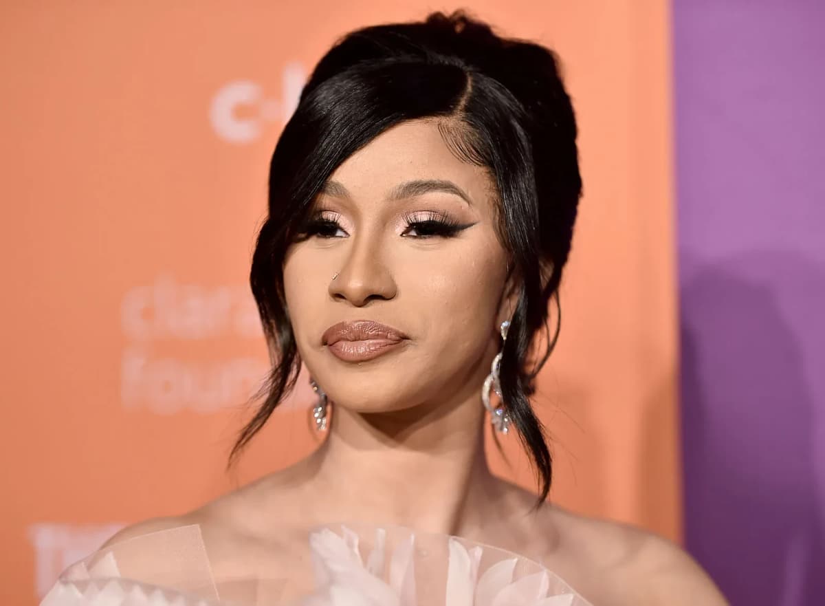Cardi B wearing deep jewel-toned ensembles with sharp contrast, showcasing midnight navy, crimson, amethyst, gunmetal, and snow white from the Deep Winter palette.
