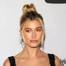 Editorial gallery of Hailey Bieber styled in soft autumn looks mixing moss green, terracotta, and bronzed neutrals, highlighting mushroom taupe, oat milk, rose beige, warm espresso, and soft olive.