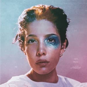 Editorial gallery of Halsey styled in deep winter looks featuring sapphire, garnet, and chrome accents, highlighting midnight navy, crimson, amethyst, gunmetal, and snow white.
