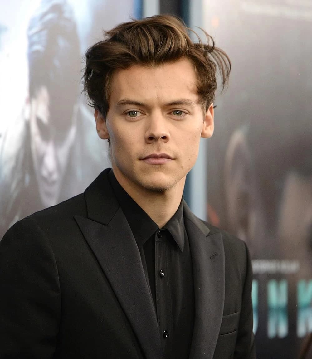 Editorial gallery of Harry Styles styled in warm spring looks packed with coral, turquoise, and golden accents, highlighting papaya orange, sunny marigold, aqua turquoise, creamy ivory, and rose gold.