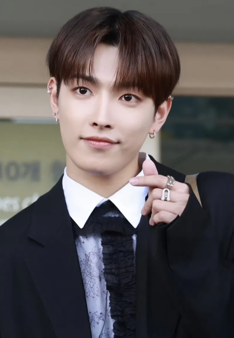 Hongjoong (ATEEZ) wearing cool jewel-toned gowns with sharp contrast, showcasing glacier blue, raspberry, graphite, arctic white, and ultra black from the Cool Winter palette.