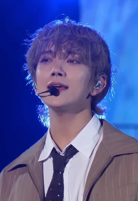 Joshua (SEVENTEEN) wearing velvety pastel looks with cool-muted tones, showcasing heather gray, dusty mauve, mist blue, slate green, and antique silver from the Soft Summer palette.