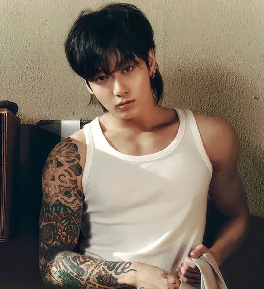 Editorial gallery of Jungkook (BTS) styled in deep winter looks featuring sapphire, garnet, and chrome accents, highlighting midnight navy, crimson, amethyst, gunmetal, and snow white.