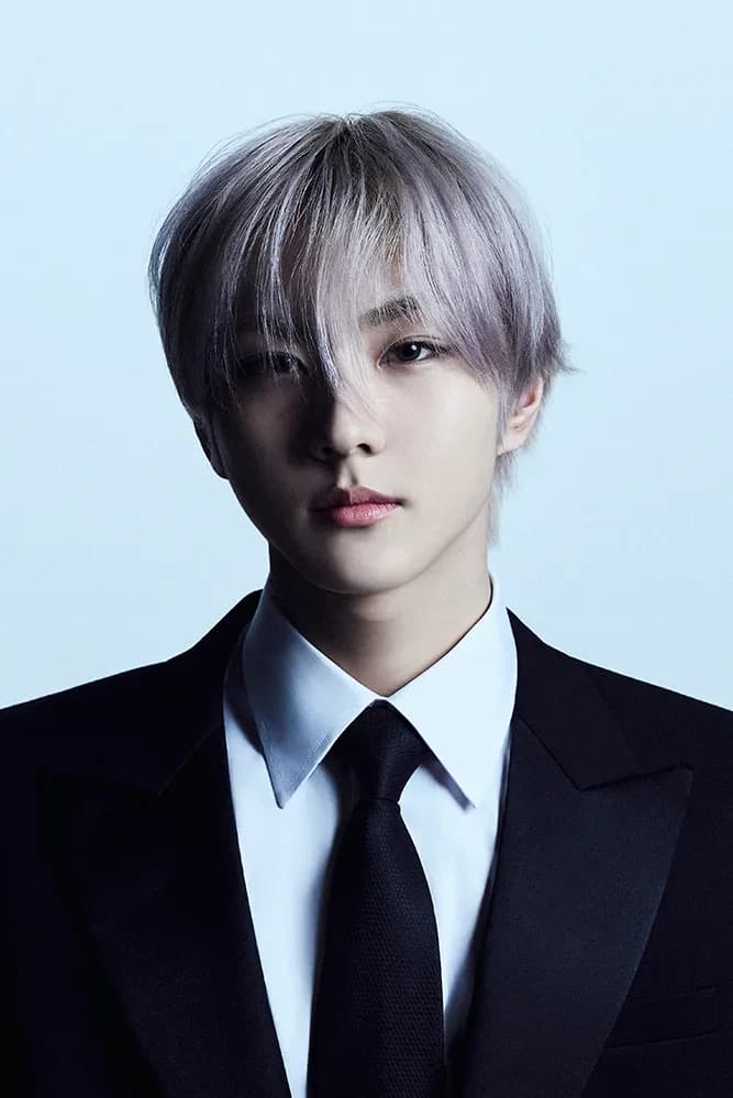 Jungwon (ENHYPEN) wearing deep jewel-toned ensembles with sharp contrast, showcasing midnight navy, crimson, amethyst, gunmetal, and snow white from the Deep Winter palette.