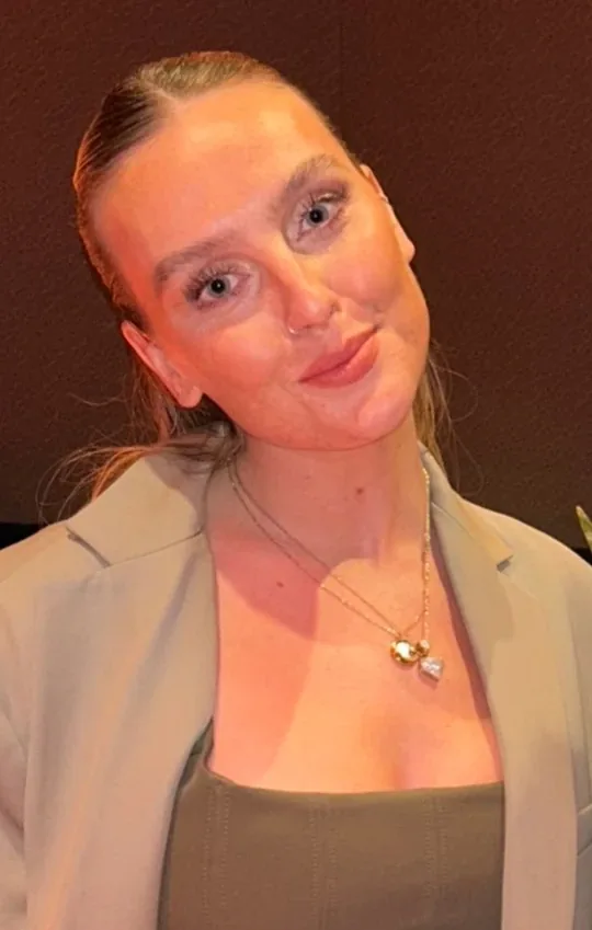 Perrie Edwards wearing airy pastel ensembles with soft tailoring, showcasing powder periwinkle, rosy shell, glacier gray, seafoam mint, and soft navy from the Light Summer palette.