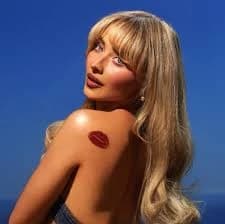 Editorial gallery of Sabrina Carpenter styled in warm spring looks packed with coral, turquoise, and golden accents, highlighting butterscotch, peach, turquoise, creamy ivory, and bubblegum pink.