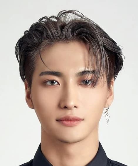 Editorial gallery of Seonghwa (ATEEZ) styled in vibrant autumn outfits featuring saffron, teal, and gold hardware, highlighting burnt sienna, chartreuse, emerald, molten gold, and espresso.