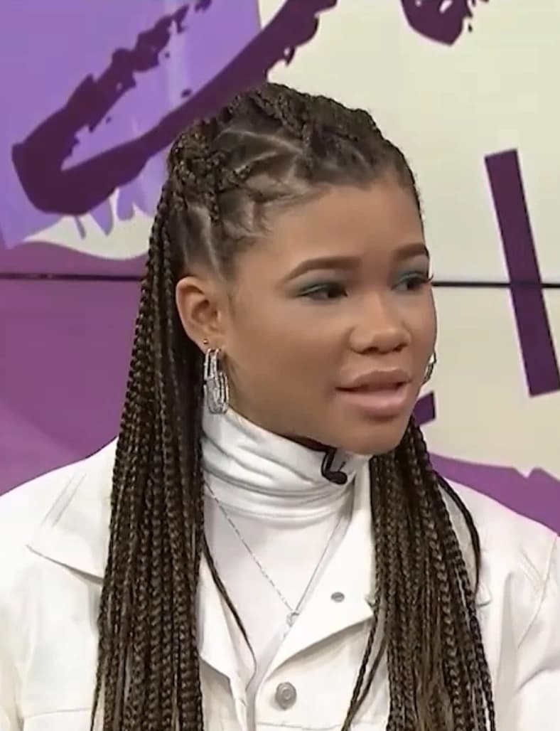 Storm Reid wearing luminous spring outfits with juicy warm hues, showcasing clementine, turquoise, butter yellow, lime, and poppy red from the Warm Spring palette.
