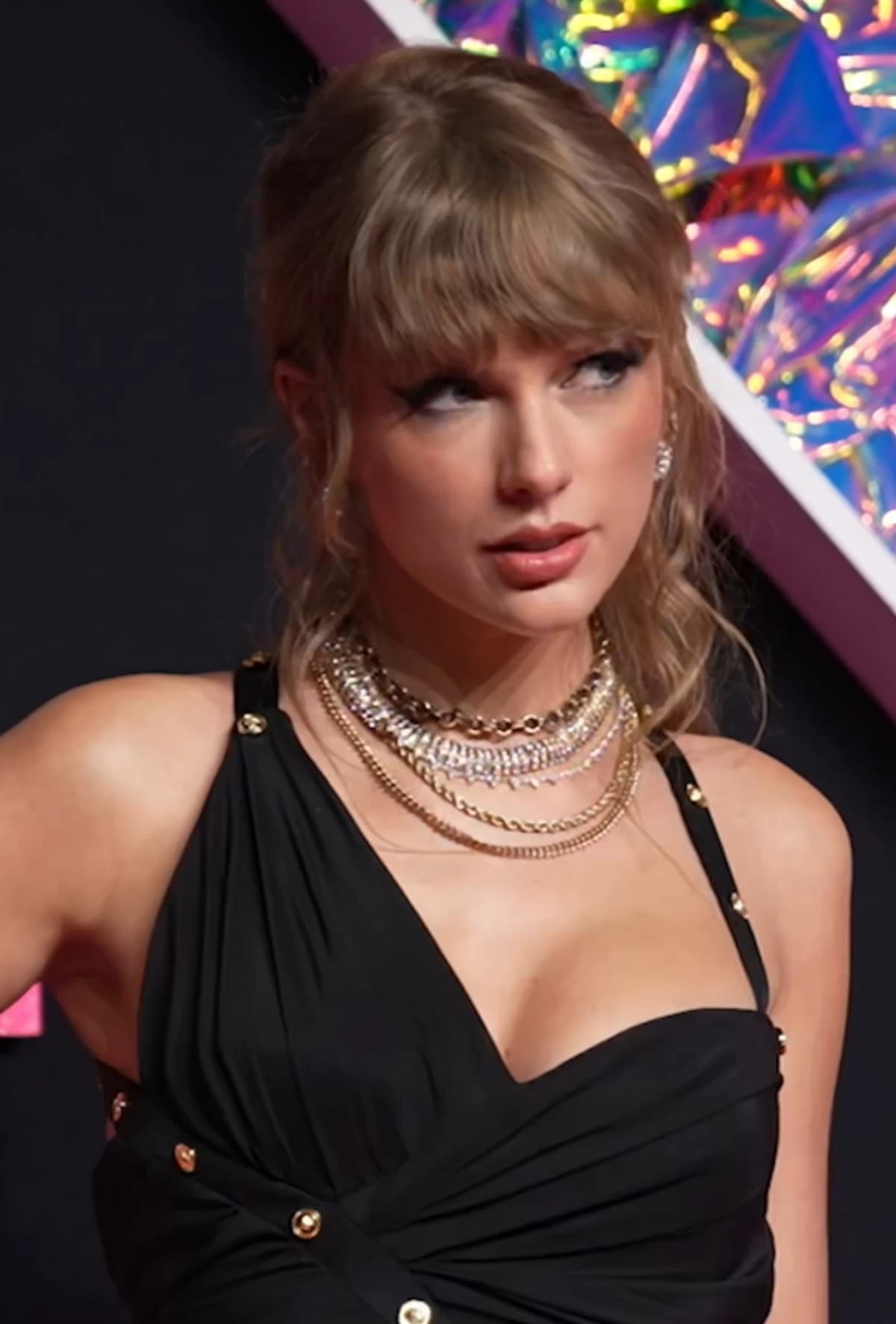 Taylor Swift wearing icy pastel tailoring with soft shimmer, showcasing powder blue, icy pink, lavender, soft navy, and sterling silver from the Cool Summer palette.