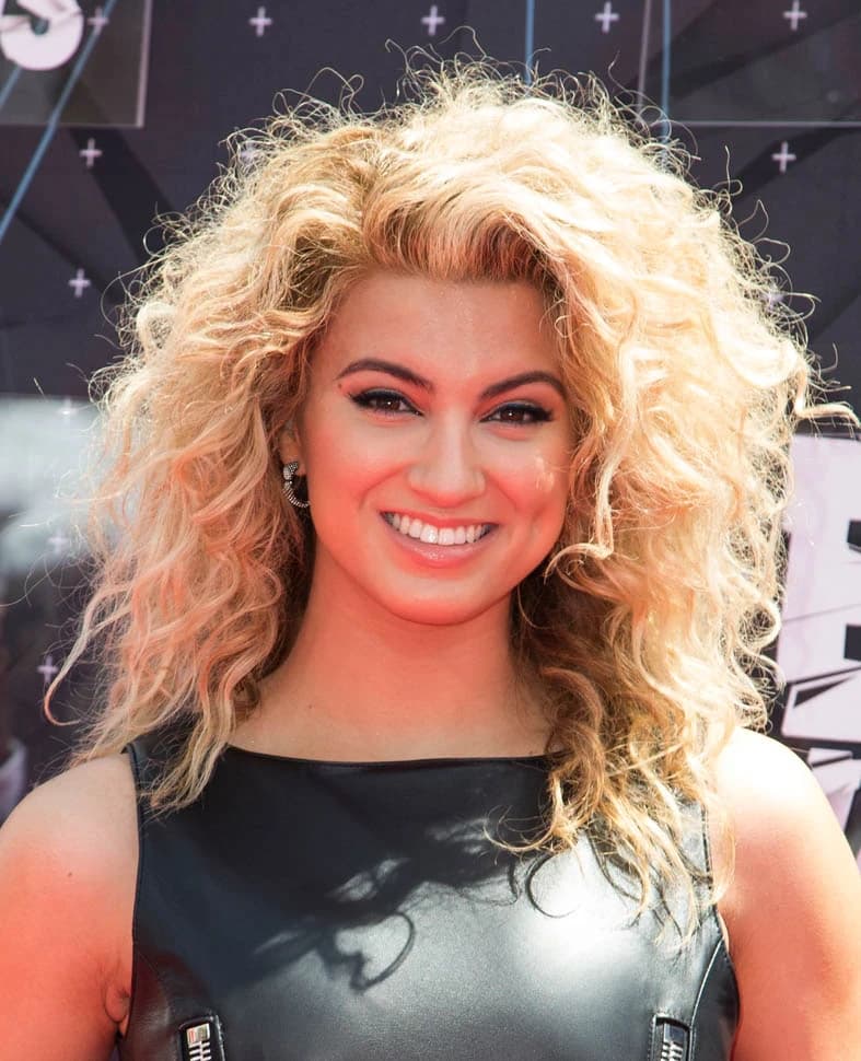 Editorial gallery of Tori Kelly styled in soft summer outfits blending dusty mauve, mist blue, and slate neutrals, highlighting heather gray, dusty mauve, mist blue, slate green, and antique silver.