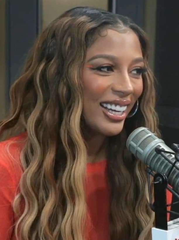 Victoria Monét wearing muted autumn ensembles with velvety textures and gentle warmth, showcasing desert rose, sage green, oatmeal, copper brown, and soft teal from the Soft Autumn palette.