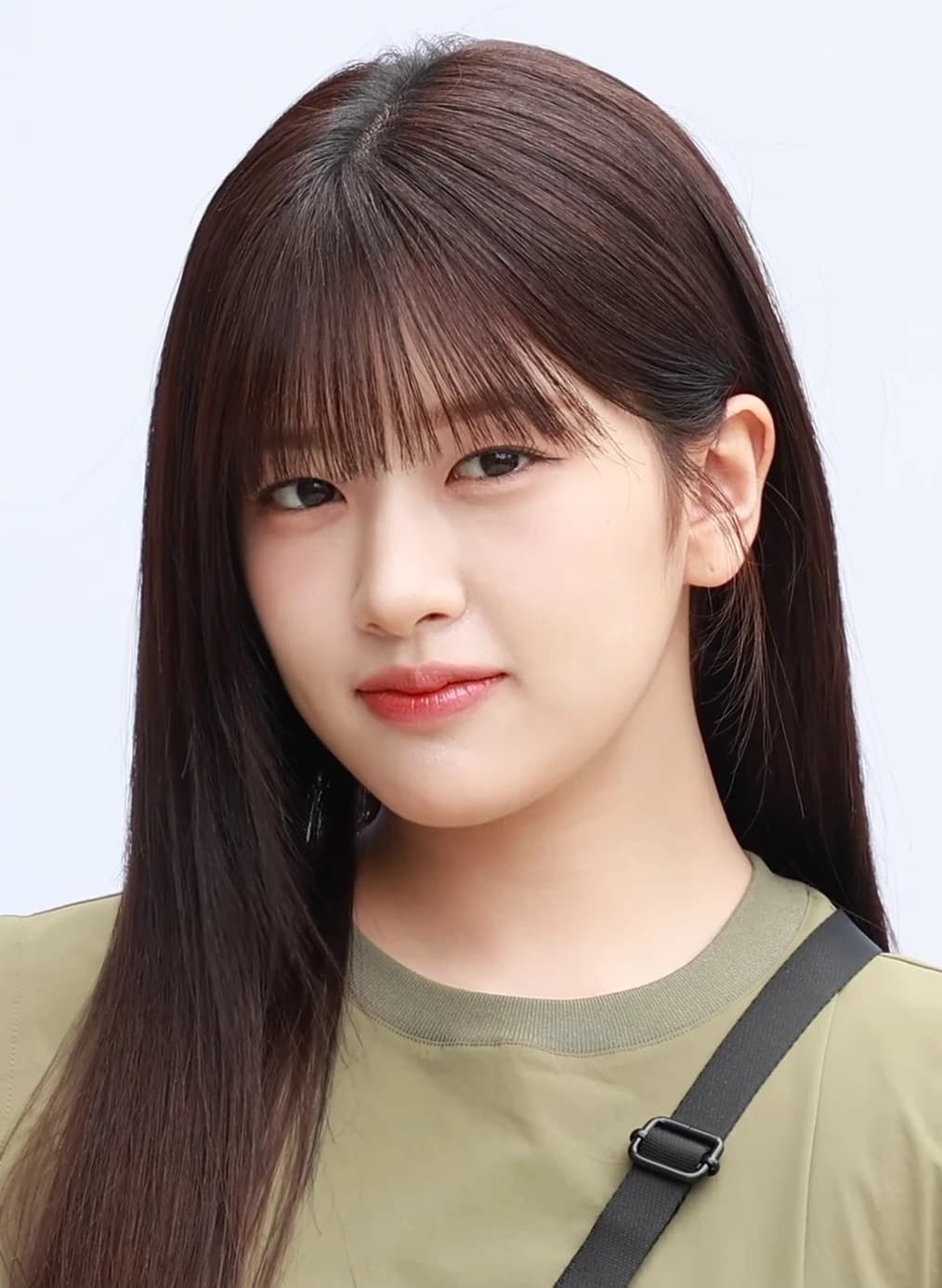 Yujin (IVE) wearing high-voltage winter ensembles with electric hues and chrome accents, showcasing fuchsia, royal blue, silver chrome, acid lime, and deep plum from the Vibrant Winter palette.