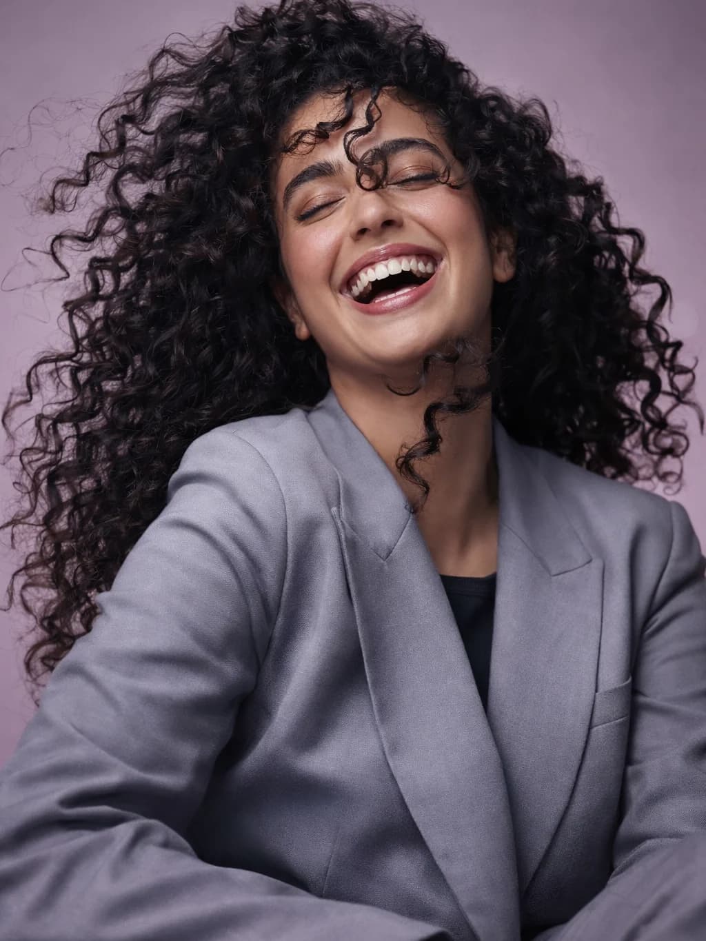 Woman comparing color swatches in New York 2