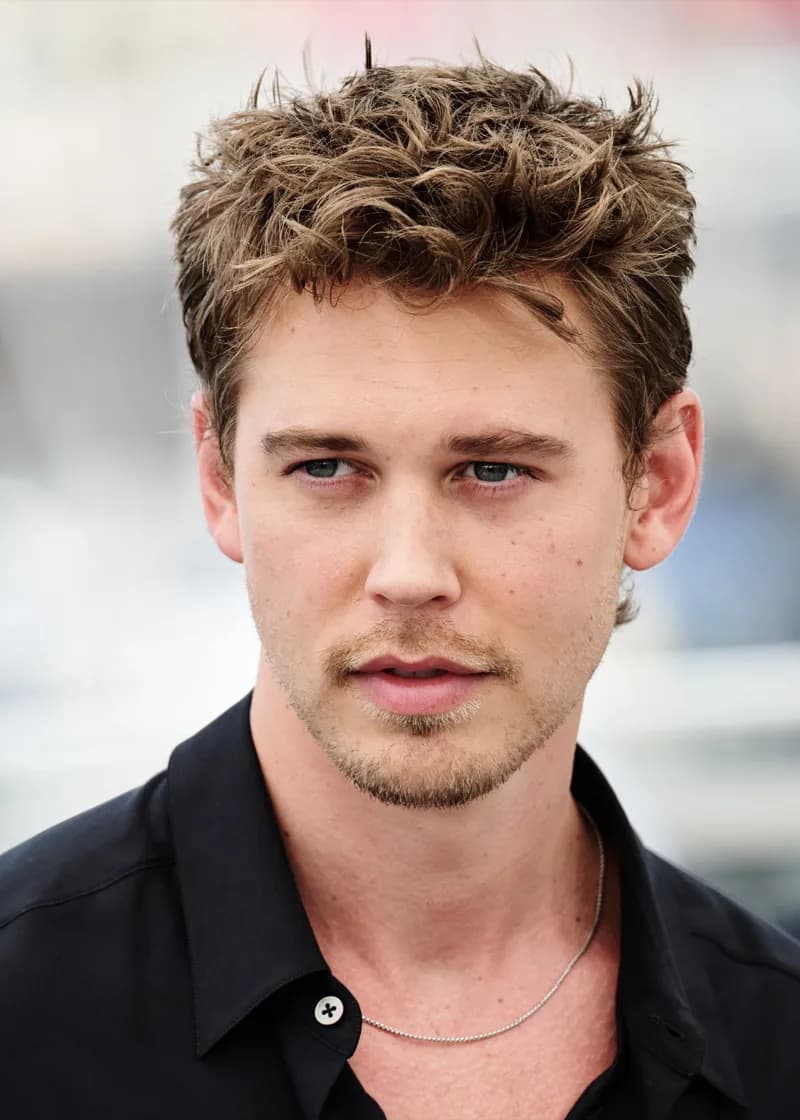 Austin Butler — Cool Winter color palette | Palette Hunt Austin Butler wearing cool jewel-toned gowns with sharp contrast, showcasing glacier blue, raspberry, graphite, arctic white, and ultra black from the Cool Winter palette.