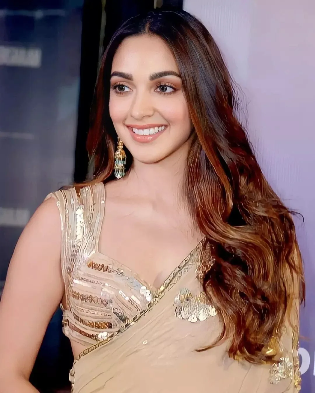 Kiara Advani — Vibrant Autumn color palette | Palette Hunt Kiara Advani wearing saturated autumn looks with molten metallics, showcasing saffron gold, deep turquoise, crimson ruby, olive bronze, and espresso from the Vibrant Autumn palette.