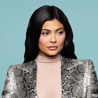 Kylie Jenner — Neutral Winter styling | Palette Hunt Editorial gallery of Kylie Jenner styled in neutral winter outfits highlighting sapphire, burgundy, and smoked grays, highlighting onyx, graphite, powder pink, optic white, and silver chrome.