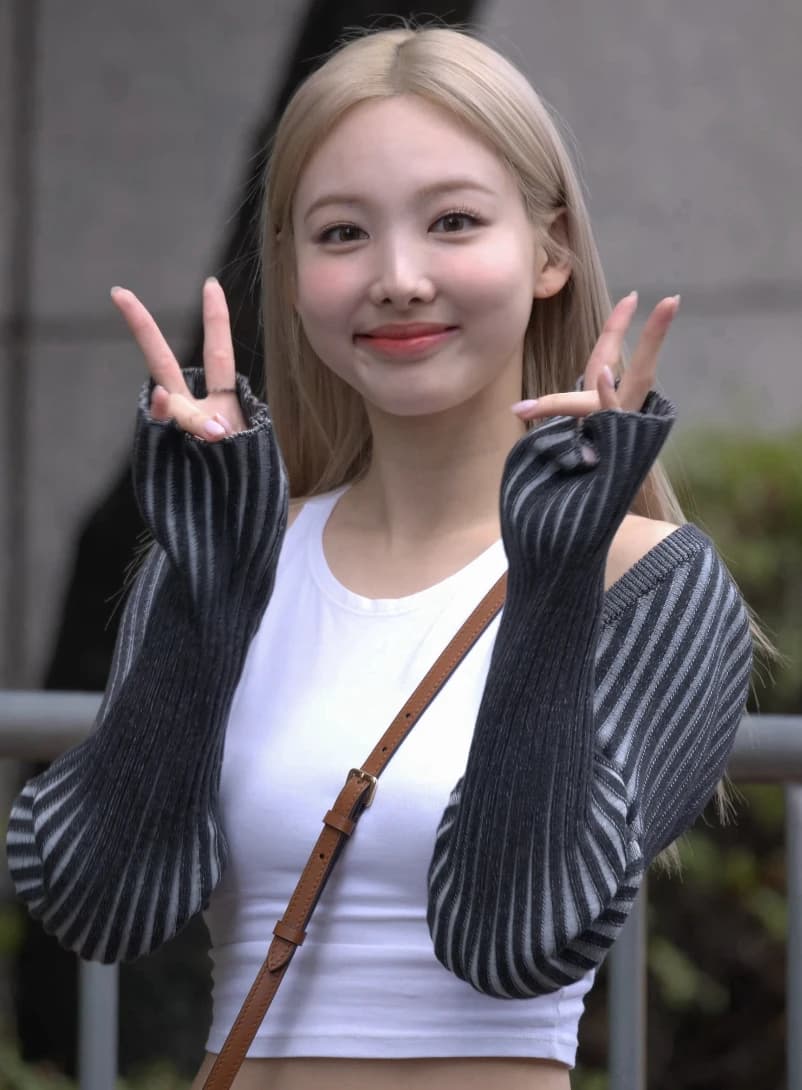 Nayeon (TWICE) wearing cool jewel-toned gowns with sharp contrast, showcasing glacier blue, raspberry, graphite, arctic white, and ultra black from the Cool Winter palette.