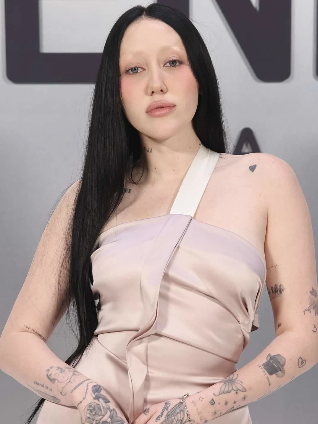 Noah Cyrus — Light Summer styling | Palette Hunt Editorial gallery of Noah Cyrus styled in light summer outfits blending powder blues, lilac, and silvery neutrals, highlighting sky blue, cool blush, opal gray, mint chiffon, and soft navy.
