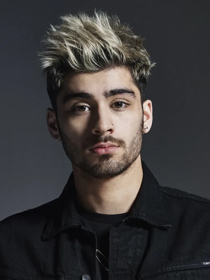 Zayn — Warm Spring color palette | Palette Hunt Zayn wearing luminous spring outfits with juicy warm hues, showcasing papaya orange, sunny marigold, aqua turquoise, creamy ivory, and rose gold from the Warm Spring palette.