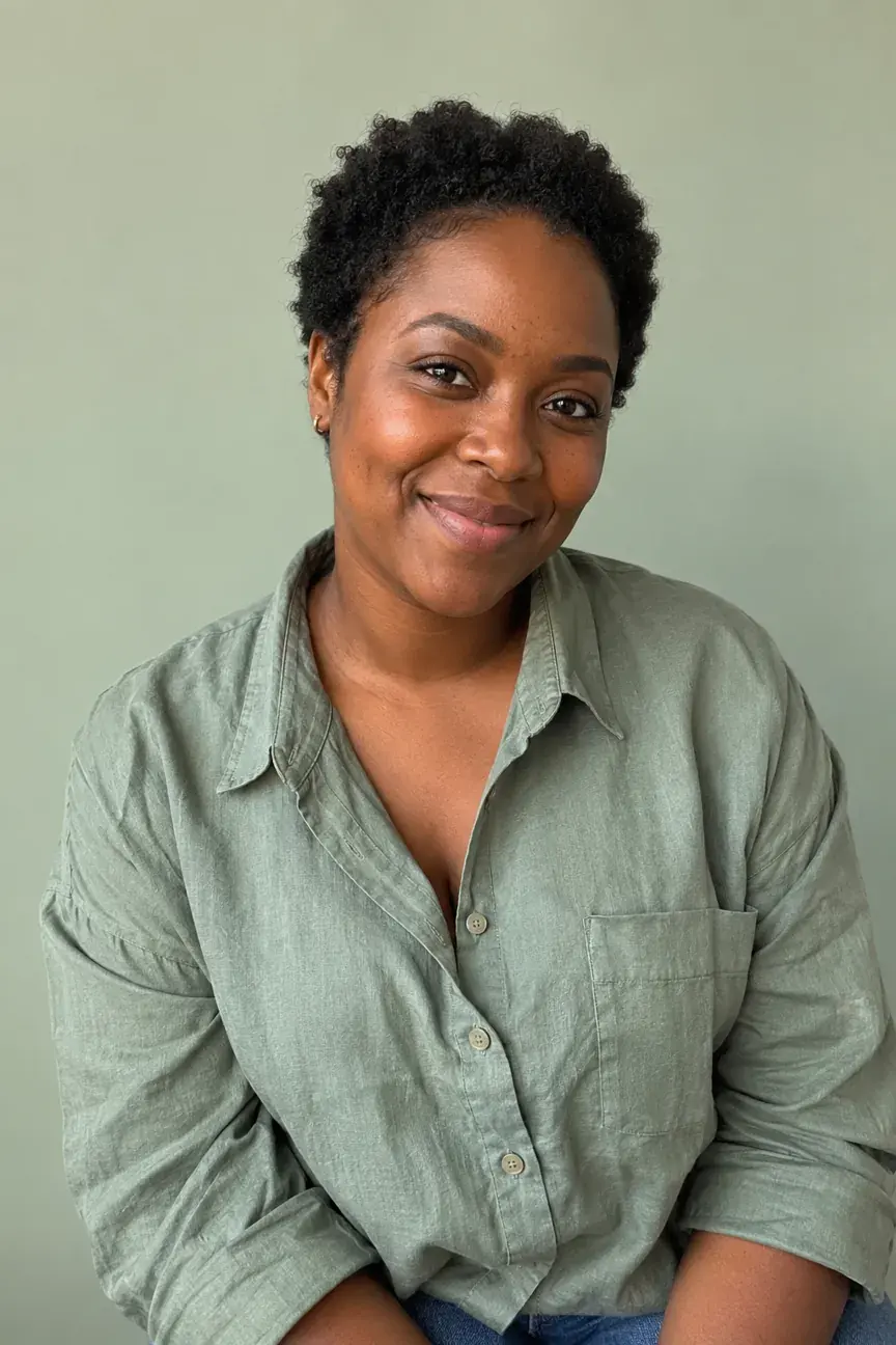 Woman wearing soft green colors for a personal color analysis app comparison