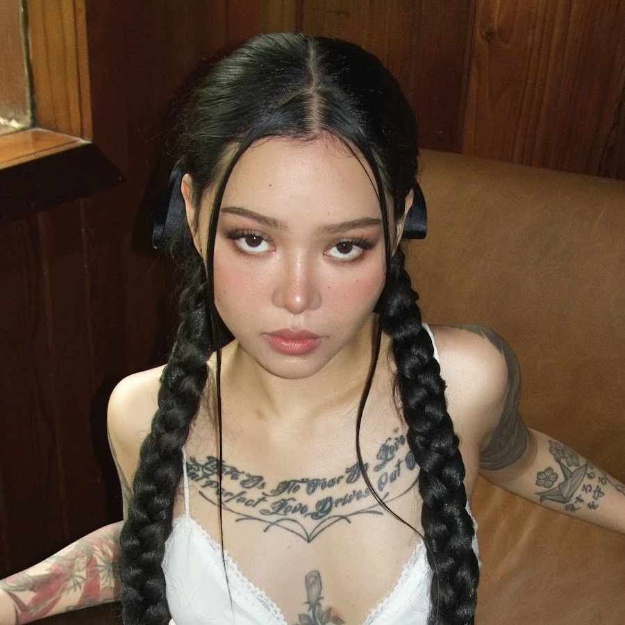 Bella Poarch wearing velvety pastel looks with cool-muted tones, showcasing heather gray, dusty mauve, mist blue, slate green, and antique silver from the Soft Summer palette.