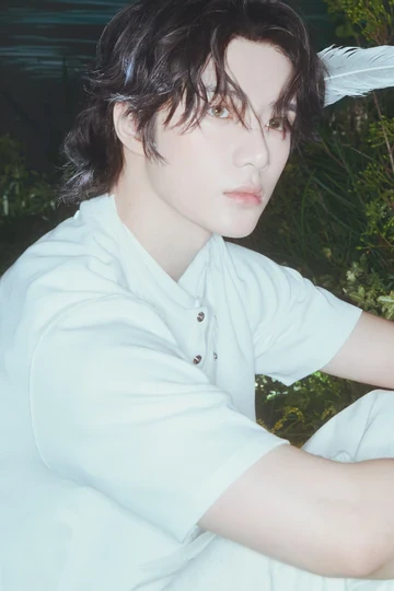 Beomgyu (TXT) wearing cool jewel-toned gowns with sharp contrast, showcasing glacier blue, raspberry, graphite, arctic white, and ultra black from the Cool Winter palette.