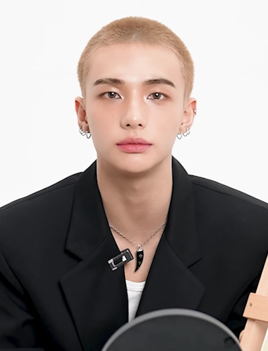 Hyunjin (Stray Kids) wearing saturated autumn looks with molten metallics, showcasing burnt sienna, chartreuse, emerald, molten gold, and espresso from the Vibrant Autumn palette.