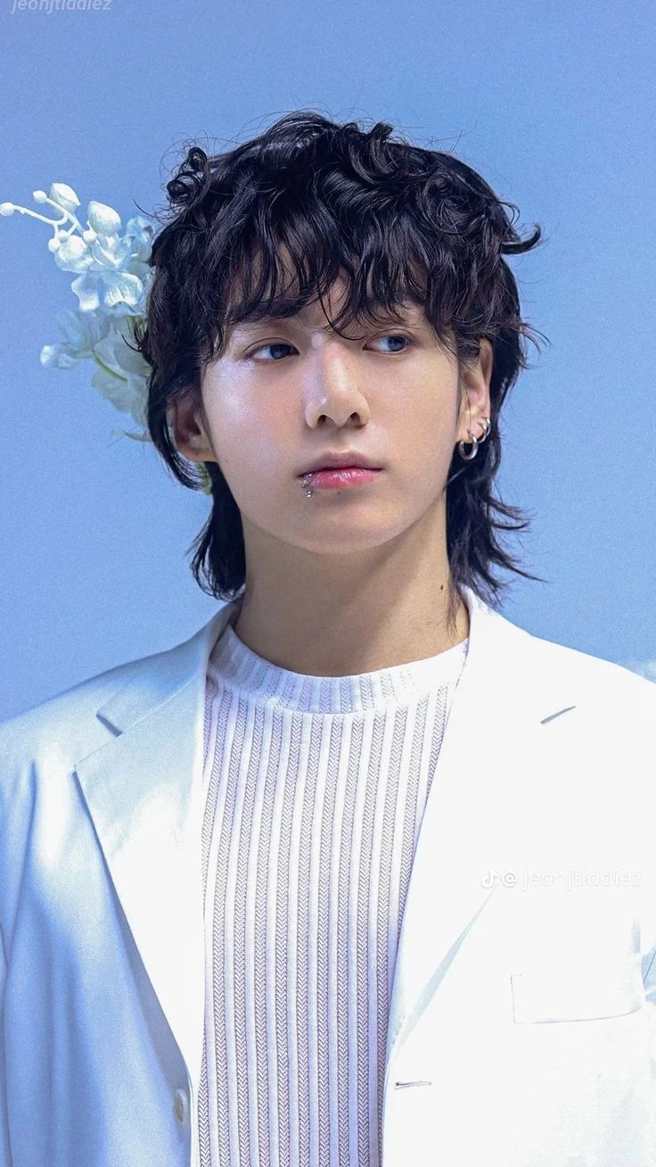 Jungkook (BTS) wearing deep jewel-toned ensembles with sharp contrast, showcasing midnight navy, crimson, amethyst, gunmetal, and snow white from the Deep Winter palette.