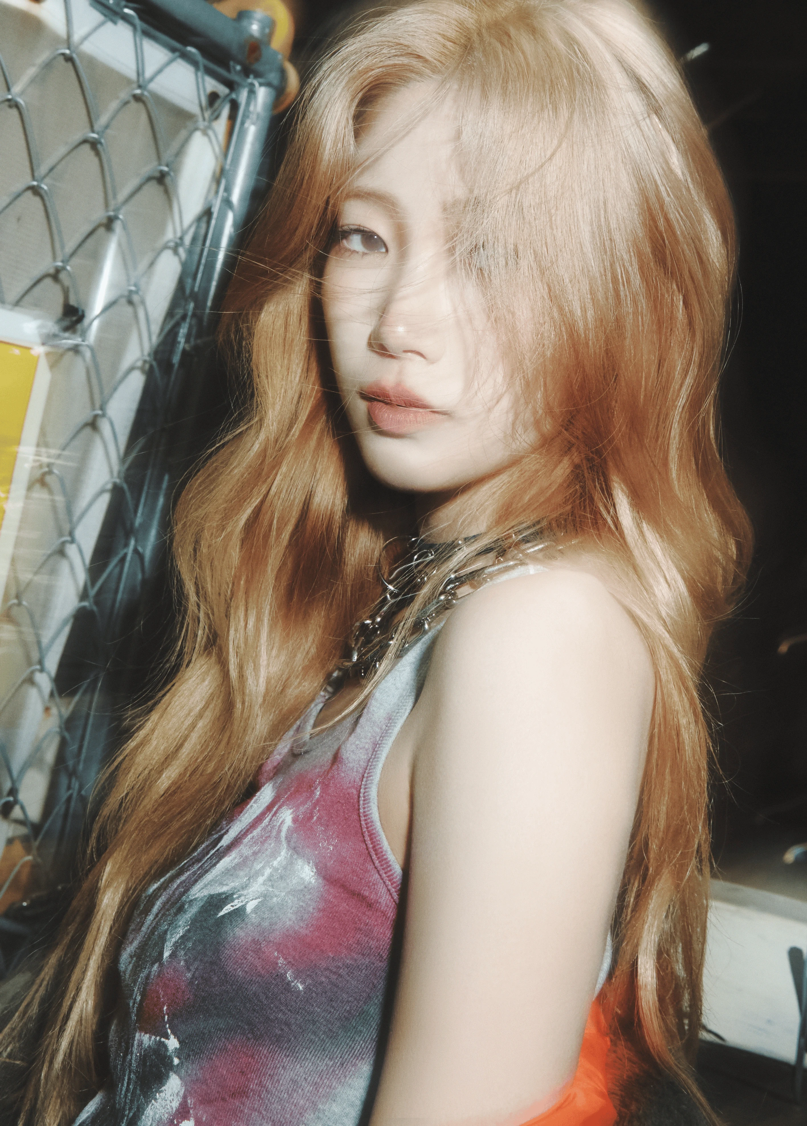 Kazuha (LE SSERAFIM) wearing balanced jewel-toned looks with cool neutrals, showcasing steel blue, cranberry, optic white, graphite, and imperial purple from the Neutral Winter palette.