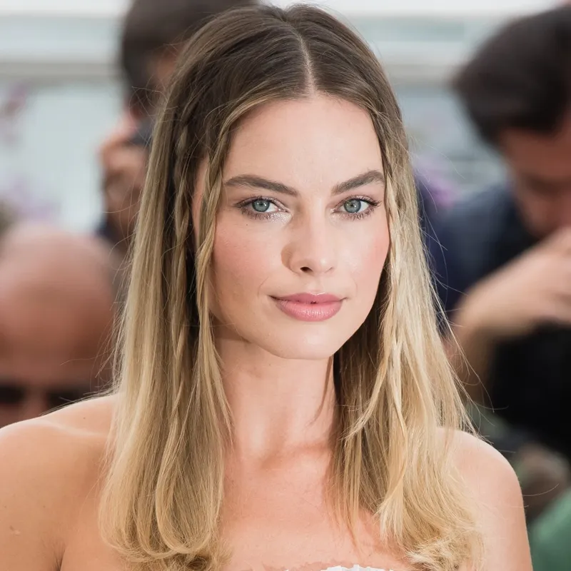 Margot Robbie — Warm Spring styling | Palette Hunt Editorial gallery of Margot Robbie styled in warm spring looks packed with coral, turquoise, and golden accents, highlighting sorbet pink, buttercream, coral, aqua, and sunny yellow.