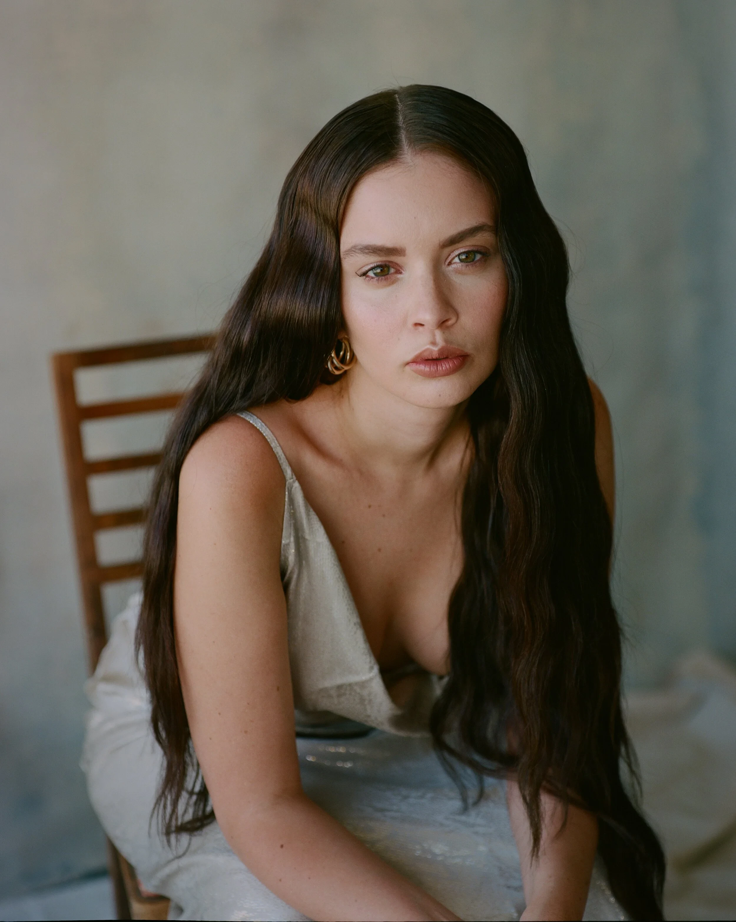 Sabrina Claudio wearing velvety pastel looks with cool-muted tones, showcasing heather gray, dusty mauve, mist blue, slate green, and antique silver from the Soft Summer palette.