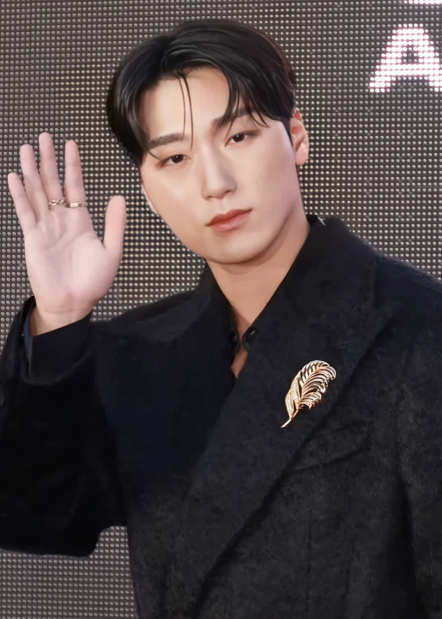 San (ATEEZ) wearing deep jewel-toned ensembles with sharp contrast, showcasing midnight navy, crimson, amethyst, gunmetal, and snow white from the Deep Winter palette.