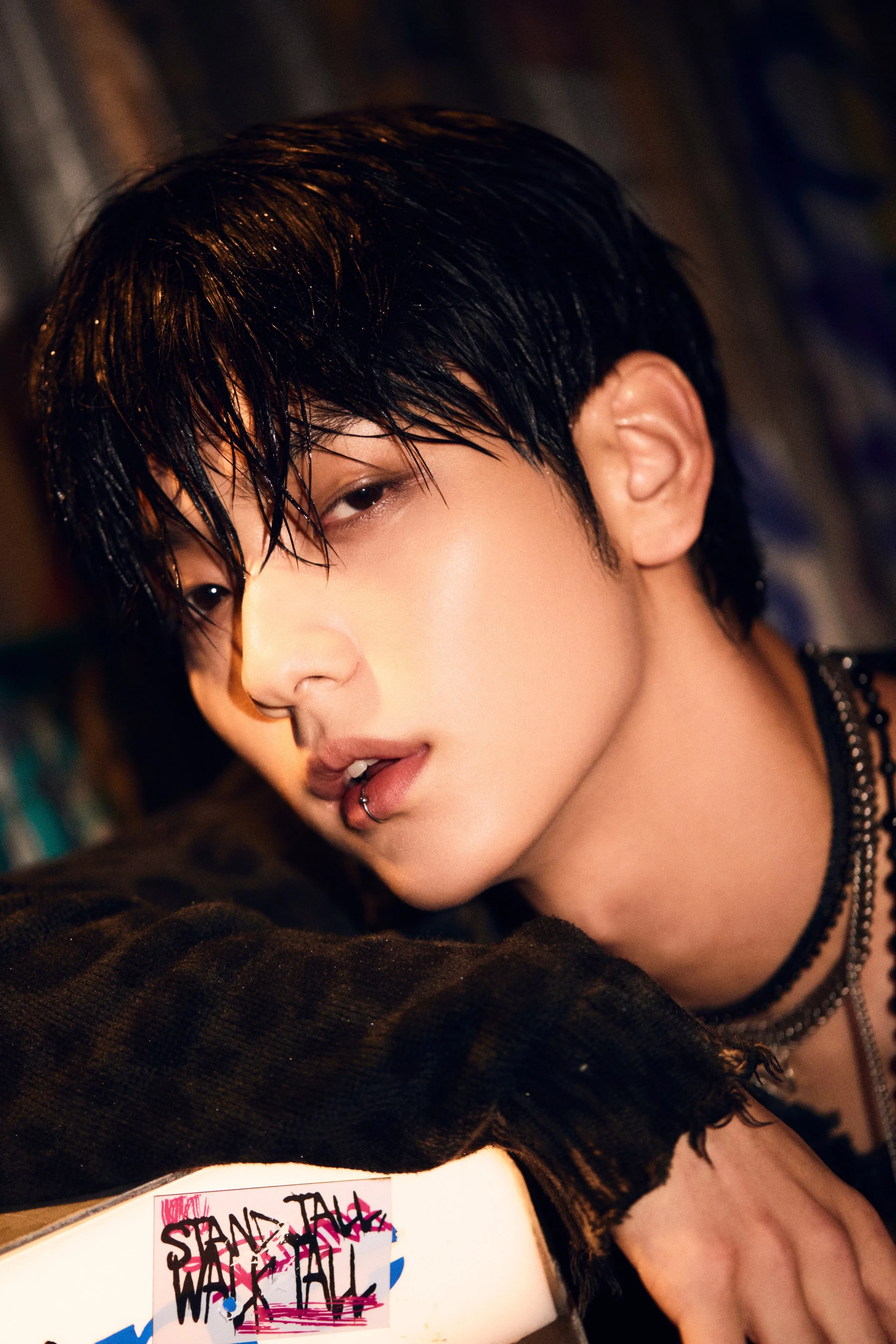 Soobin (TXT) wearing high-contrast electric brights paired with sharp tailoring, showcasing ultra violet, neon fuchsia, electric jade, polished pewter, and onyx from the Bold Winter palette.