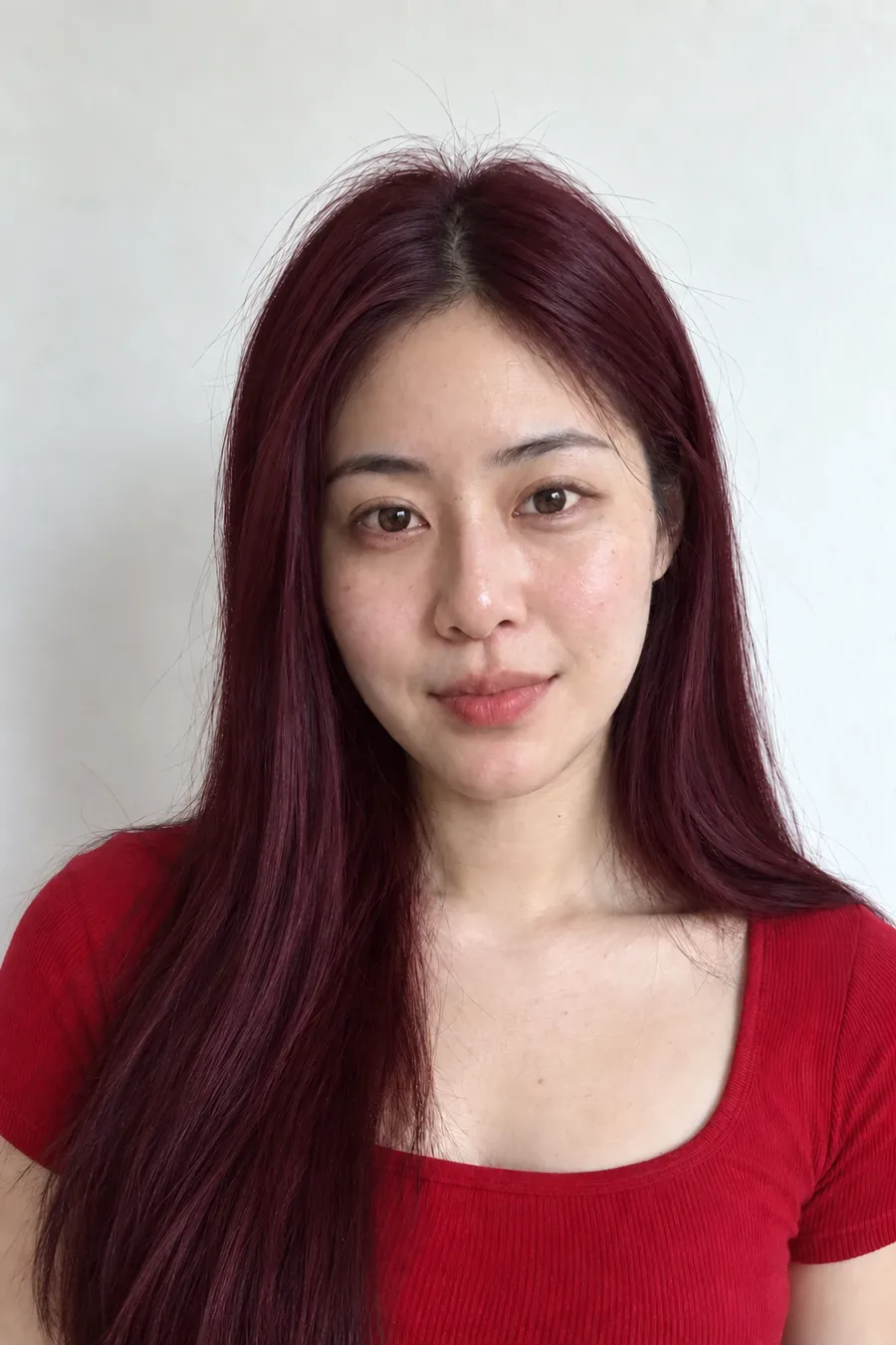 Burgundy hair on a woman with true winter coloring
